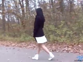 Excellent dark haired teen with huge tits pissing outdoor