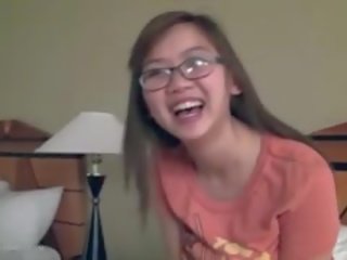 Cute Busty Asian girlfriend Fngers In Glasses