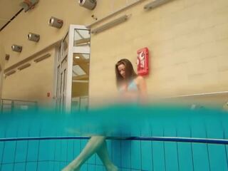 Beguiling brunette Deniska underwater