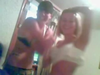 Two marvelous drunk teens strip, fondles and kiss on webcam clip